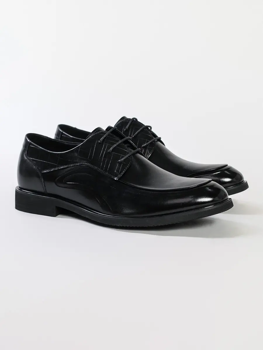 Туфли черного цвета на низком каблуке